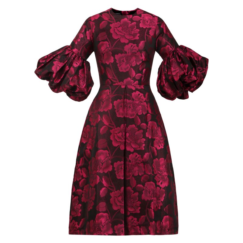 A Pleated Dress With Pink Floral Motifs And Voluminous Puff Sleeves