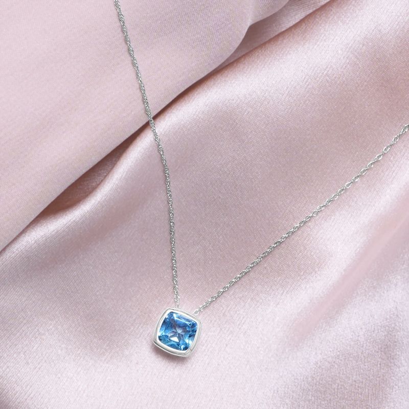 Ashley- Cushion Cut Blue Topaz Bezel Set Pendant In 10K White Gold image