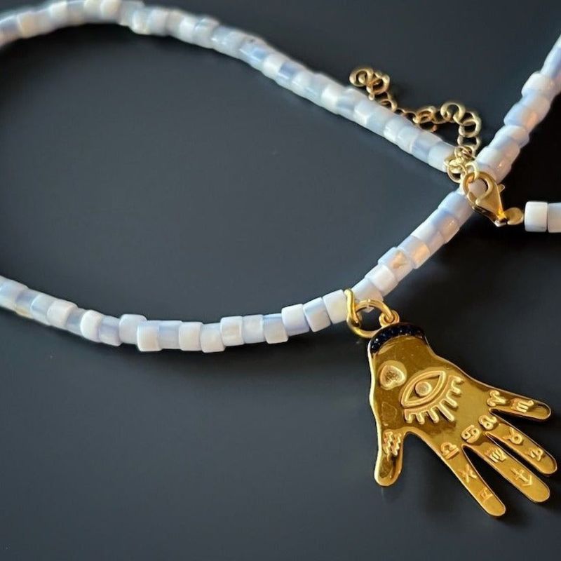 Grounding necklace top