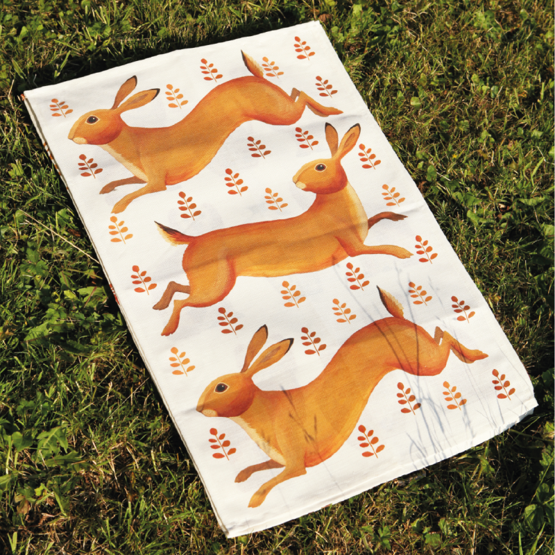 Hurrying Hares Tea Towel image
