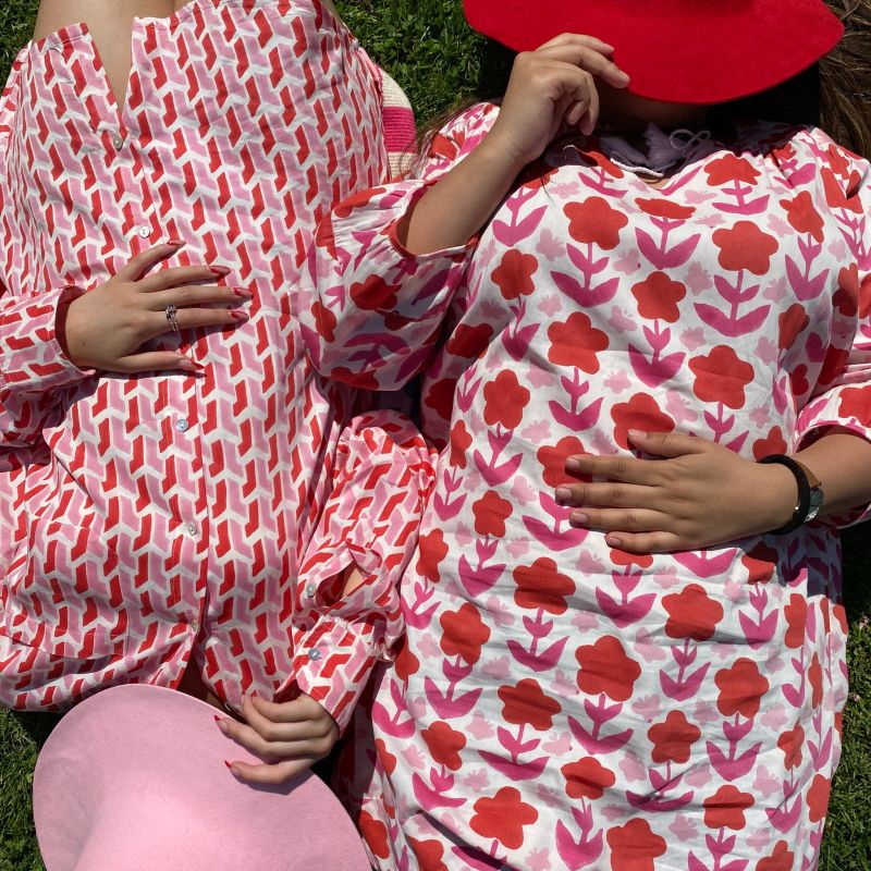 Joni Organic Cotton Tassel Tie Dress With Bracelet Sleeves And Side Pockets In Pink And Red Zinnia Block Print image