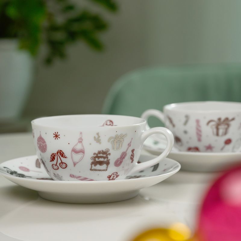 Set Of Two Festive Teacups And Saucers image