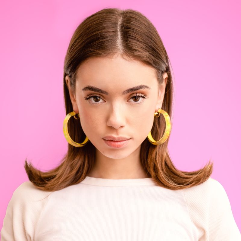 Large Lucite Iridescent Hoops In Yellow image