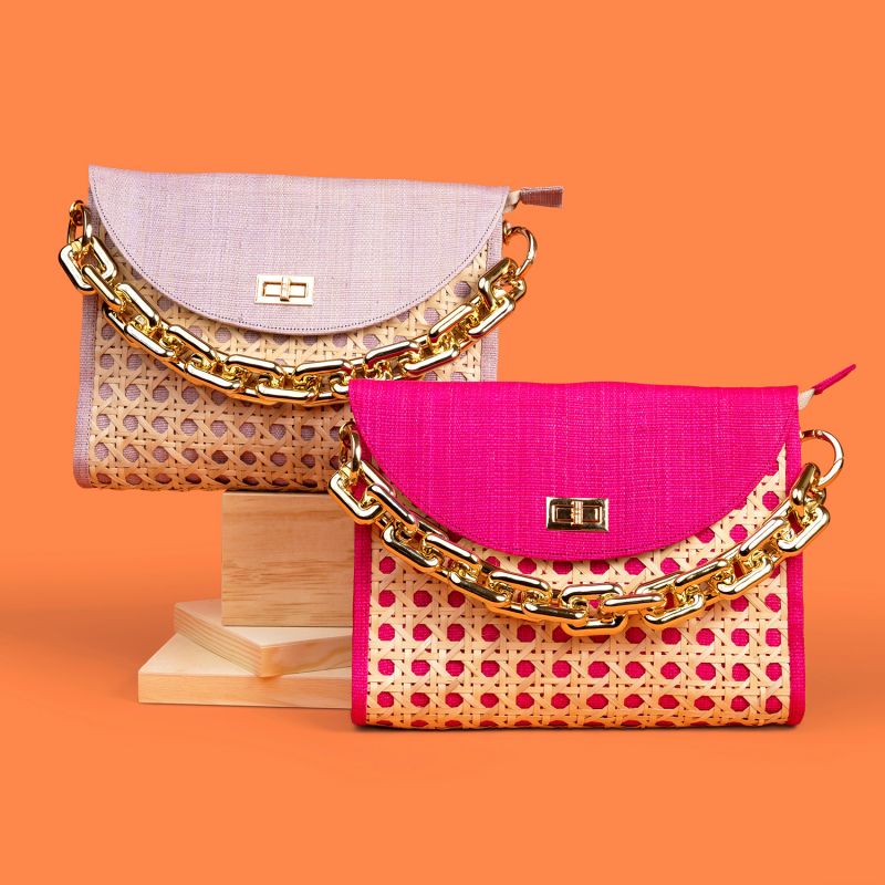 The Soleil Pink Rattan Woven Clutch With Large Gold Chain image