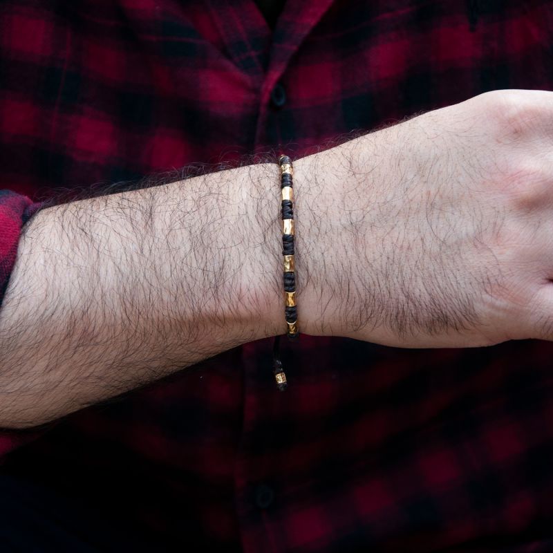 Baby hand bracelet deals gold with black beads