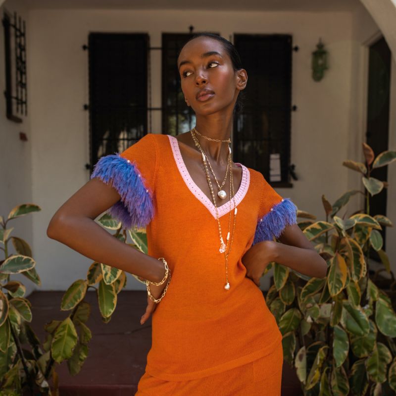 Orange Top With Handmade Knit Details & Pearl Buttons image