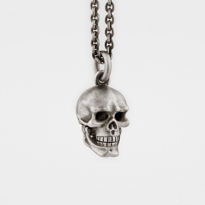 Skull Pendant with Hinged Jaw and Diamond Eyes in Sterling Silver image