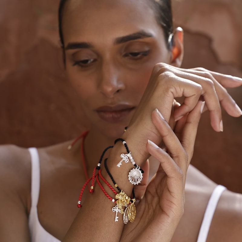 Always Rising Charm Bracelet - Gold Plated & Red Cord | Rize | Wolf ...