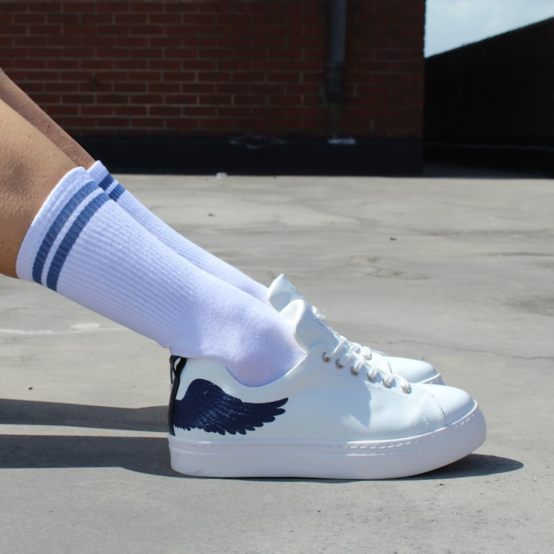 Thumbnail of Angel's Ease - Classic Trainer In White With Midnight Blue Wing image