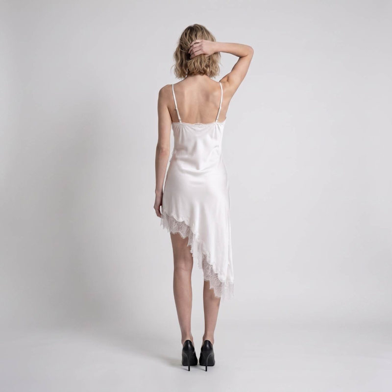 asymmetrical slip dress Yvette Maxi With Hem The fluid silhouette combines sophisticated glamour with contemporary edge LUCIANA SLIP DRESS
