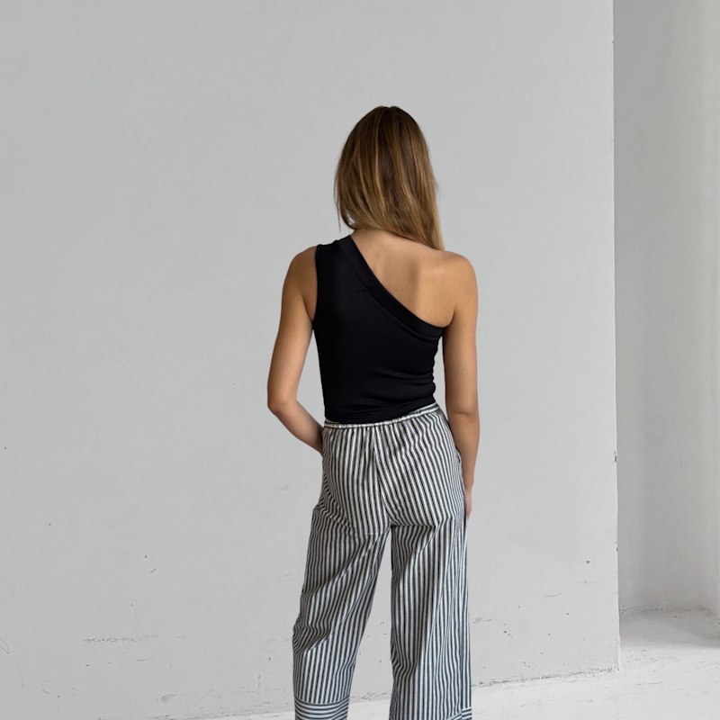 Thumbnail of Black One Shoulder Top With White Flower Pin image