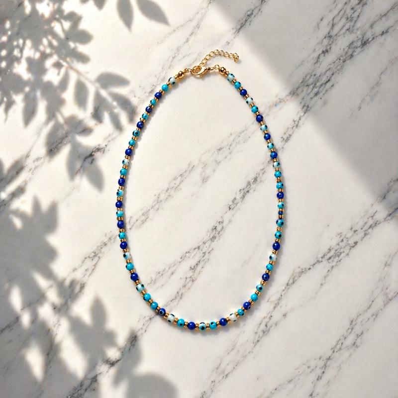 Thumbnail of Blue Evil Eye Beaded Necklace – Gold Detail Summer Choker image