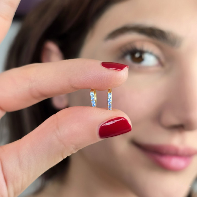 Thumbnail of Blue Topaz December Birthstone Small Huggie Earrings image