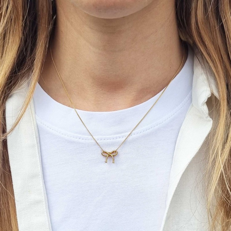 Thumbnail of Bow Necklace – Gold image