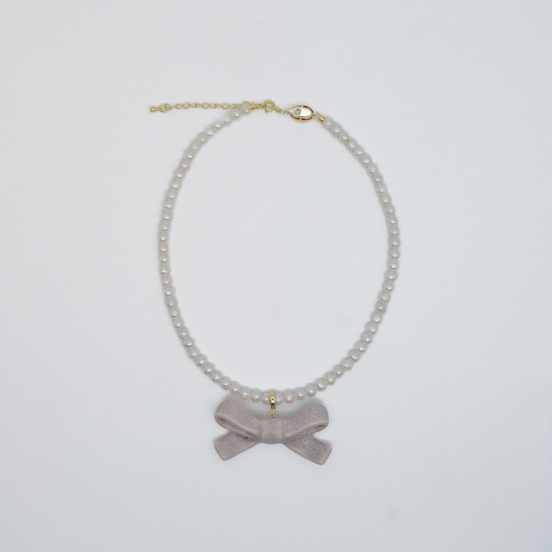 Thumbnail of Bowtie Maniac Medium Ceramic Ribbon Bowtie Round Baroque Freshwater Pearl Necklace Rose Rock Pink Gold image