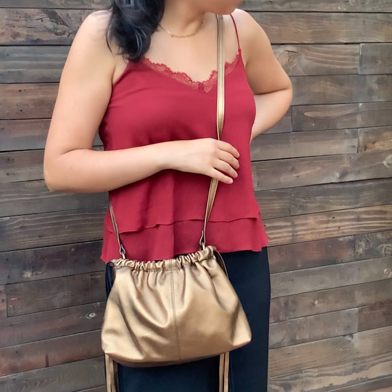 Thumbnail of Bronze Leather Clutch Bag With Tassels image