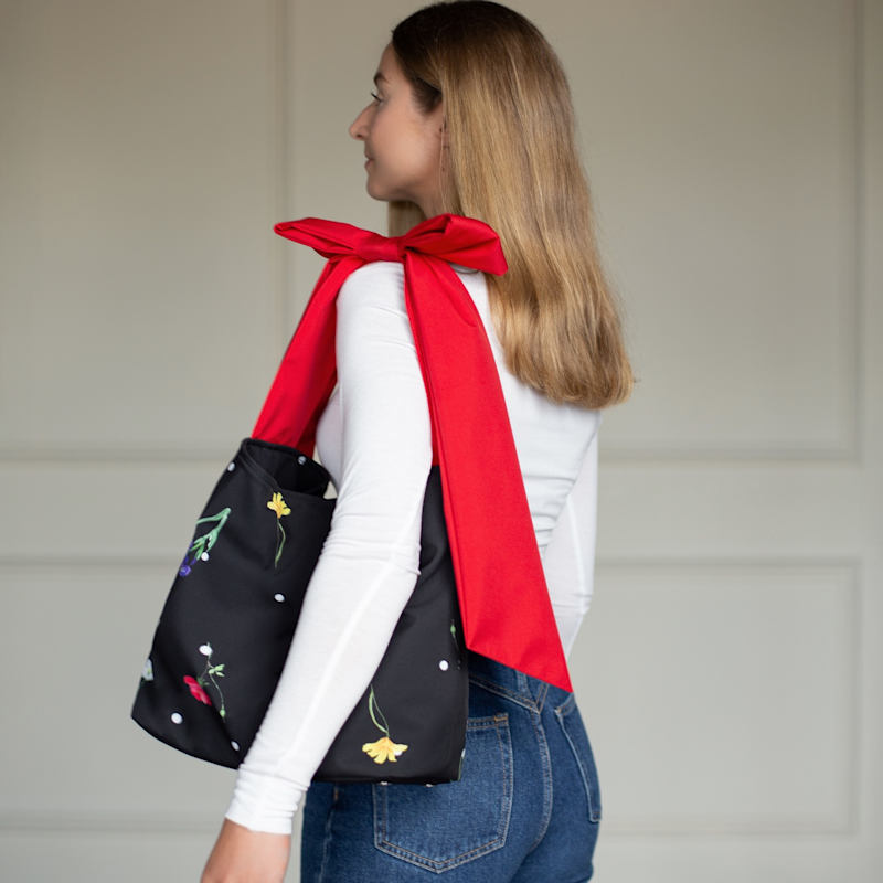 Thumbnail of Cosmic Bloom Bow Tote Bag image