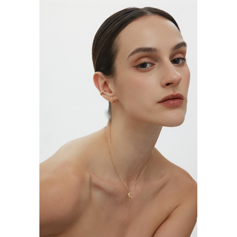 Thumbnail of Vera Twisted Crystal Ear Cuff In Gold image