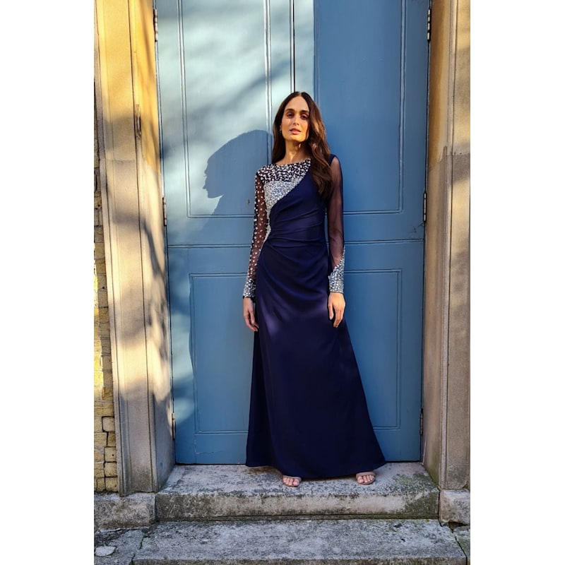Thumbnail of Cyra A Beautifully Cut Navy Floor Length Gown With Elegant Stone Work On The Sleeves & Bust Gown image