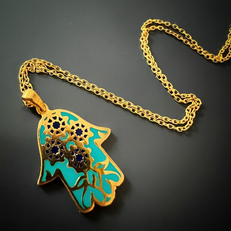 Thumbnail of Floral Hamsa Hand Pendant Turquoise & Gold Necklace - Turquoise image