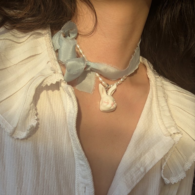 Thumbnail of Grumpy Bunny Porcelain Freshwater Pearl Necklace image