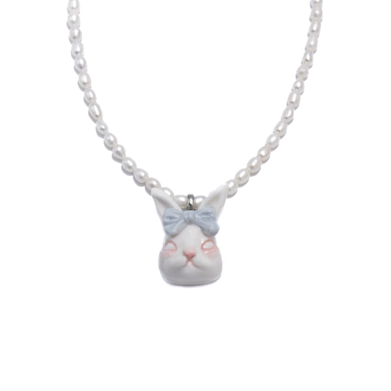 Thumbnail of Grumpy Bunny Light Misty Blue Bow Tie Freshwater Pearl Necklace image