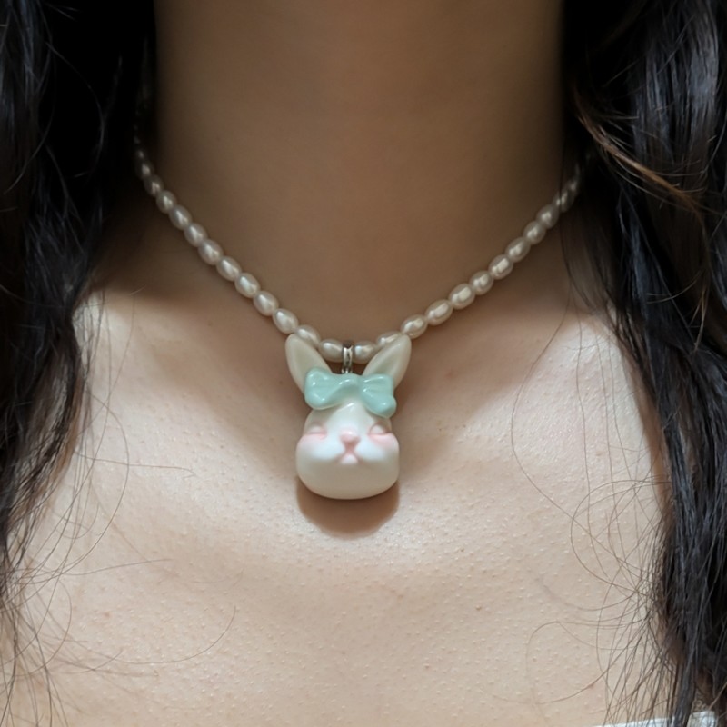 Thumbnail of Grumpy Bunny Mint Bow Tie Freshwater Pearl Necklace image