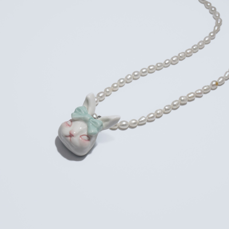 Thumbnail of Grumpy Bunny Mint Bow Tie Freshwater Pearl Necklace image
