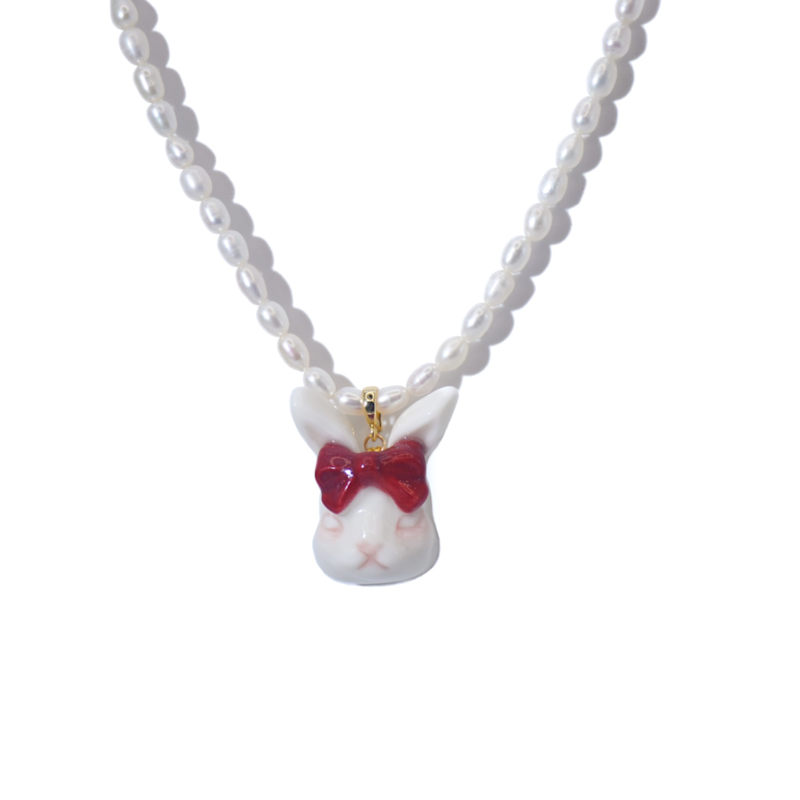 Thumbnail of Grumpy Bunny Ruby Red Bow Tie Freshwater Pearl Necklace image
