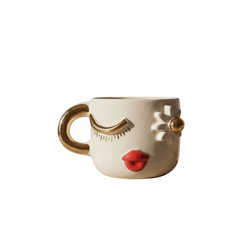 Thumbnail of Winking Daisy Face Ceramic Mug With Gold Handle image