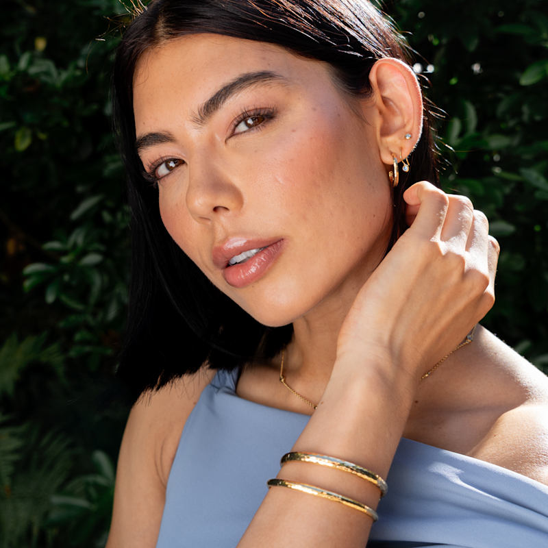 Thumbnail of Hinged Hammered Nomad Bangle In Gold Vermeil image