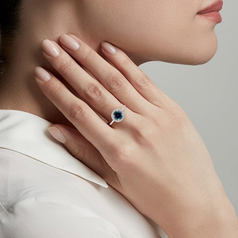 Thumbnail of London Blue Topaz & Diamond Halo Ring in 18K White Gold image