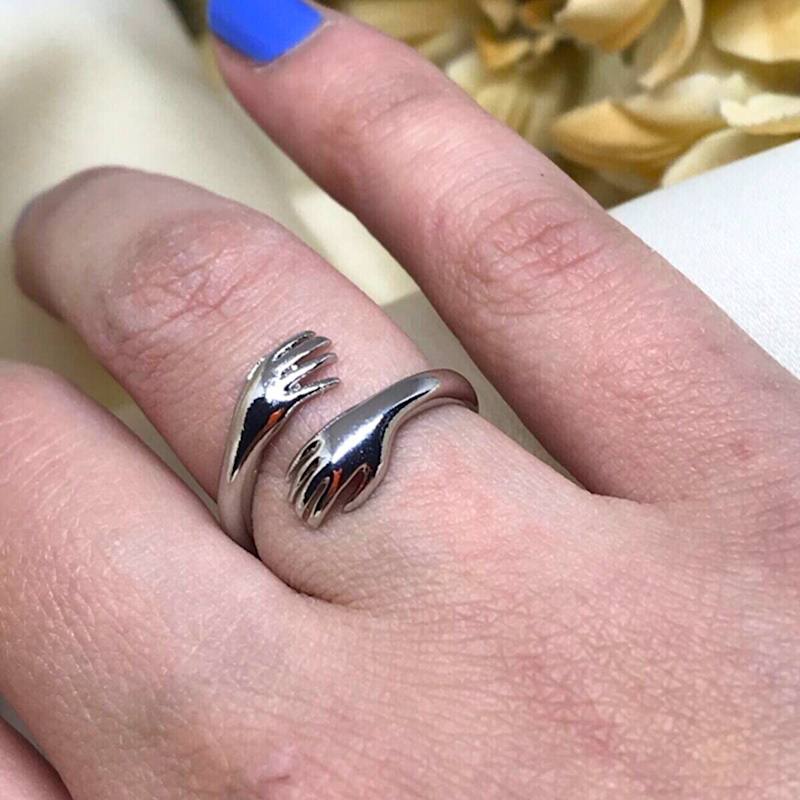 Thumbnail of Hug Ring With Hands Sterling Silver  - Silver image