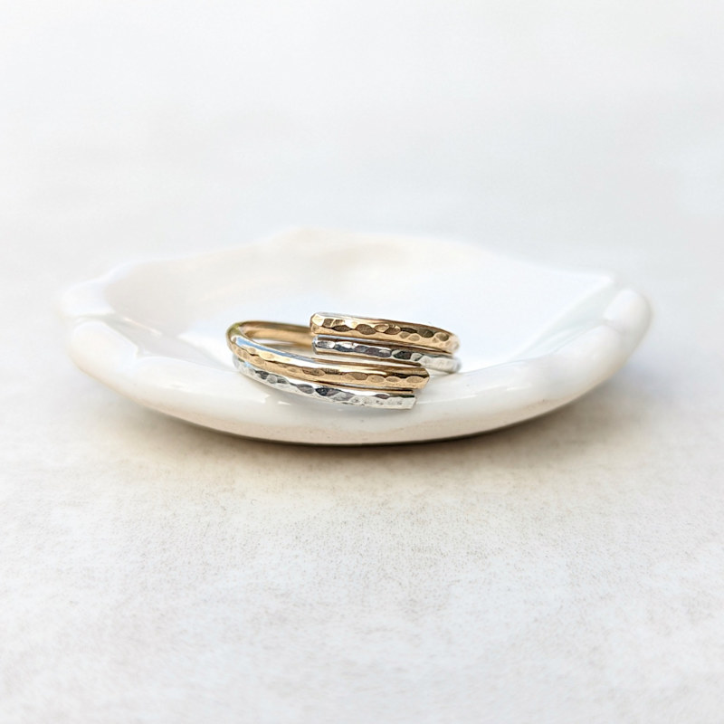 Thumbnail of Intertwined Gold And Silver Hammered Rings image