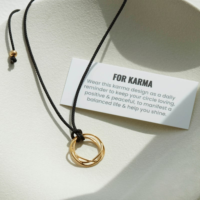 Thumbnail of Karma Circle Cord Necklace Gold image