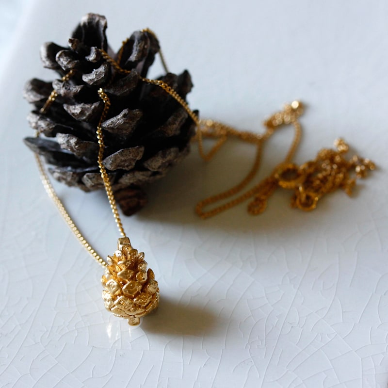 Thumbnail of Baby Pine Cone Necklace - Gold image