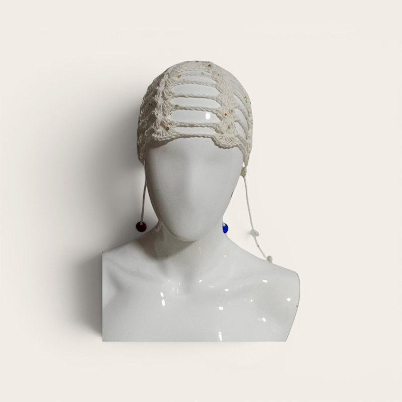 Thumbnail of Knitted Beret With Shiny Straps image