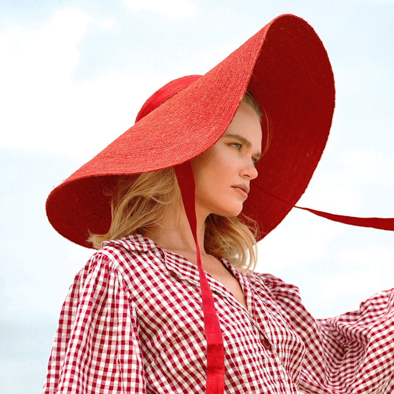 Thumbnail of Lola Wide Brim Jute Straw Hat In Red image