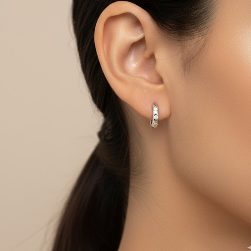 Thumbnail of Mini Halo Wings™ Sterling Silver Halo Huggie Earrings image