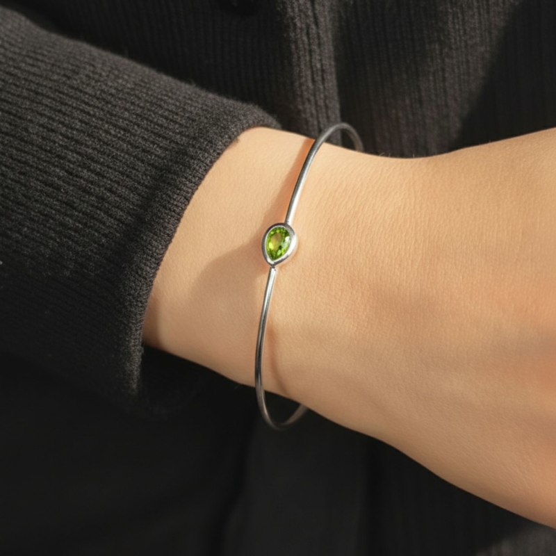 Thumbnail of Minimalist Sterling Silver Peridot August Birthstone Bangle Bracelet image