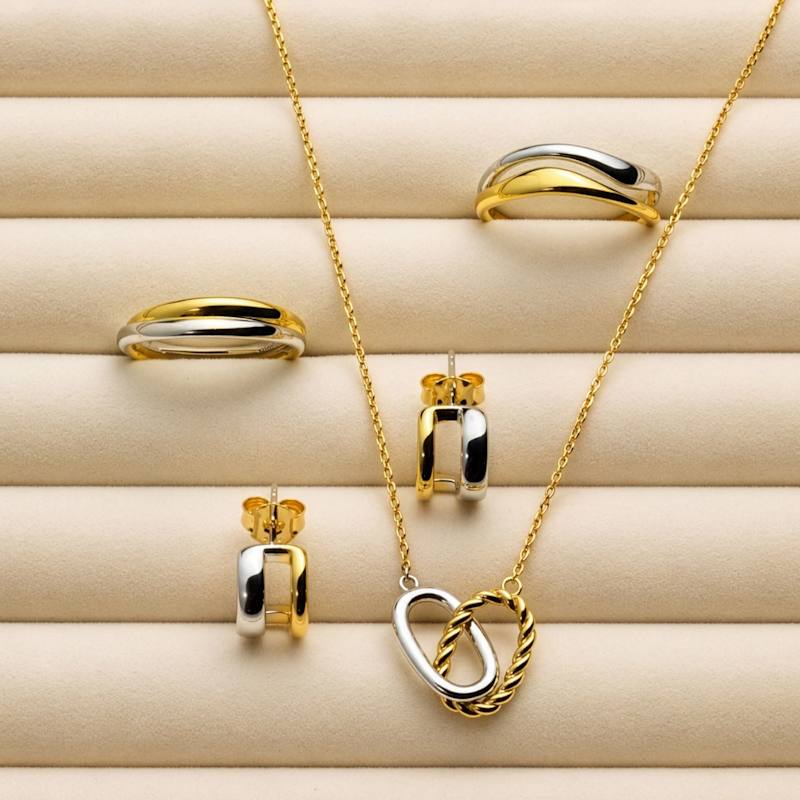 Thumbnail of Mixed Metal Cutout Huggie Hoops image