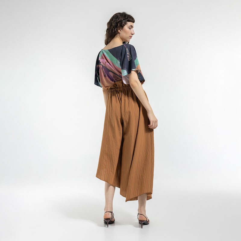 Thumbnail of Move Gold Asymmetric Midi Skirt image