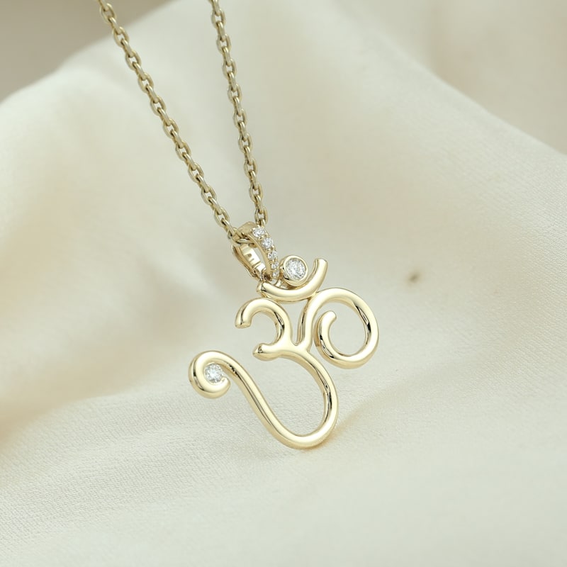 Thumbnail of Diamond Om Symbol Pendant in 14k Yellow Gold image