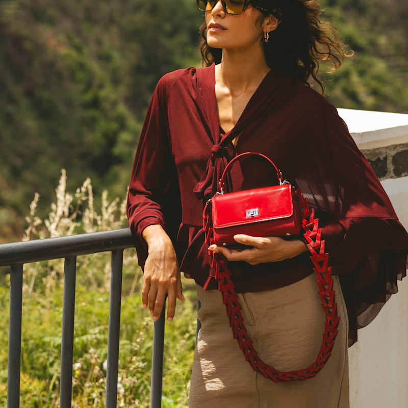Thumbnail of Red Patent Leather & Suede Lili Top Handle Bag image