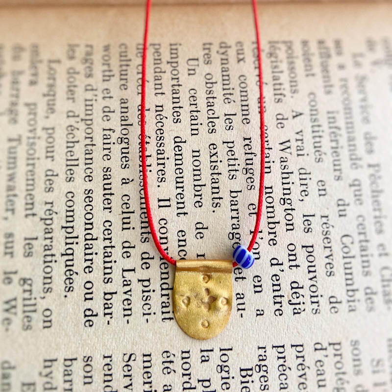 Thumbnail of Red String Necklace With Gold Charm image