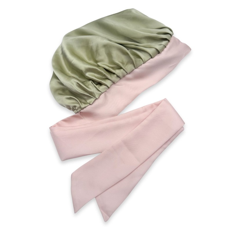 Thumbnail of Reversible Mulberry Silk Bonnet With Ties - Green & Patterned image