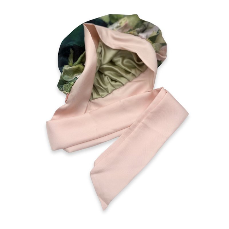 Thumbnail of Reversible Mulberry Silk Bonnet With Ties - Green & Patterned image
