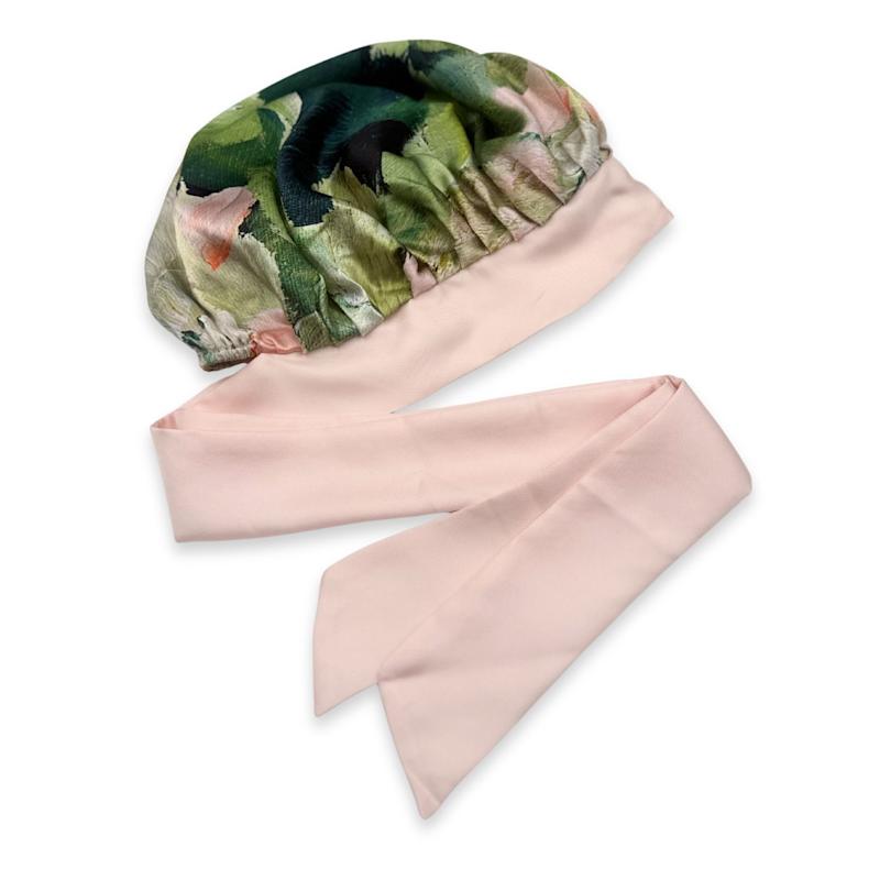 Thumbnail of Reversible Mulberry Silk Bonnet With Ties - Green & Patterned image