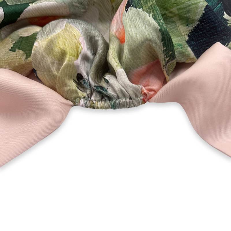 Thumbnail of Reversible Mulberry Silk Bonnet With Ties - Green & Patterned image