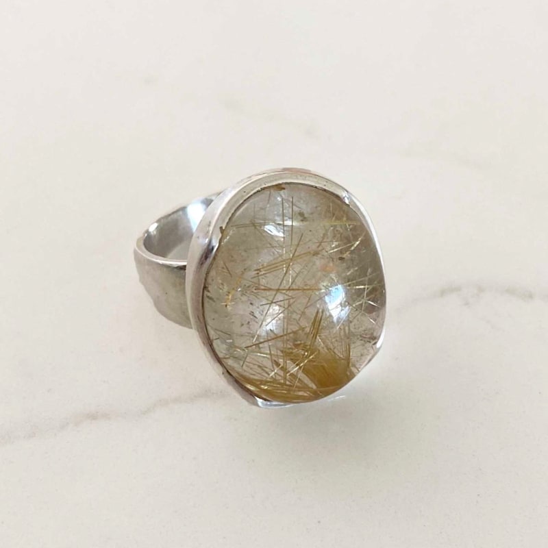 Rutilated Quartz Oval Statement Ring | Glamrocks Jewelry | Wolf & Badger